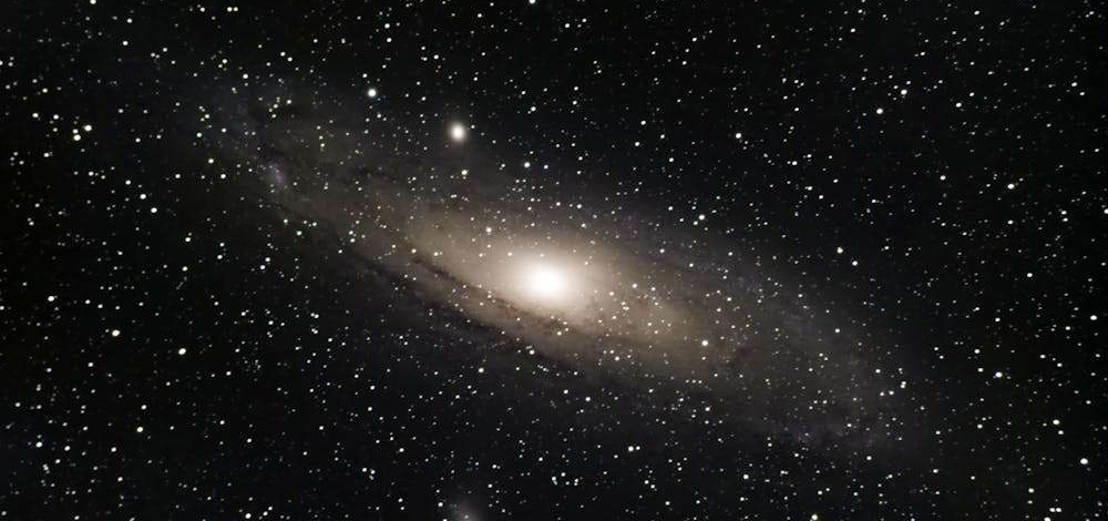 Stunning view of the Andromeda Galaxy surrounded by countless stars in outer space.